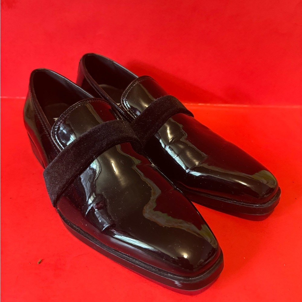 Glossy black dress shoe